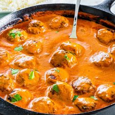 meatballs and tomato sauce in a skillet