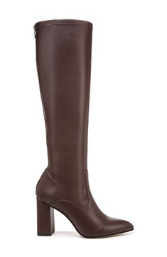 Classic and versatile, this boot is sure to be a fave thanks to a back zipper for easy on-and-off styling along with a pointed toe that gives you legs for days. 3 1/2" heel 15 1/4" shaft; 12 3/4" calf circumference Synthetic upper and lining/rubber sole Imported Faux Leather Knee-high Boots With Almond Toe For Work, Workwear Faux Leather Knee-high Boots With Almond Toe, Workwear Knee-high Faux Leather Boots With Almond Toe, Sleek Brown Boots For Workwear, Tall Boots With Stacked Heel And Pointed Toe, Office Boots With Block Heel And Tall Fit, Tall Boots With Block Heel For Office, Elegant Boots With Zipper Closure In Medium Width, Elegant Boots With Zipper Closure, Medium Width