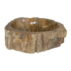 a wooden bowl that is made out of wood and has been carved into the shape of a tree stump