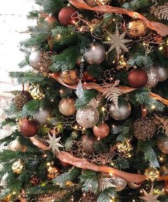 a christmas tree decorated with ornaments and lights