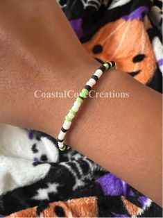 -----✰-----✰-----✰-----✰----- Happy Halloween!! 🎃 -----✰-----✰-----✰-----✰----- ╭-------✰-------  | * New LIMITED EDITION    | * Halloween bracelets have    | been released!!  | * Our new bracelets are super   | high quality and stretchy! ╰-------✰------- -----✰-----✰-----✰-----✰----- Size: 6.5 inches!✨  since they are stretchy, this size fits most wrists -----✰-----✰-----✰-----✰-----  ╭-------✰-------✰-------   | Bracelet care!👻   | * DO:    Keep it in a safe place!    Keep out of reach from White Beaded Bracelets For Halloween, Handmade White Beaded Bracelets For Halloween, Handmade White Beaded Rave Bracelets, White Handmade Beaded Bracelets For Rave, Green Themed Beaded Bracelets, Handmade Casual Halloween Jewelry, Casual Handmade Halloween Jewelry, Casual Handmade Jewelry For Halloween, White Adjustable Beaded Rave Bracelets