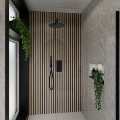 a bathroom with striped wallpaper and black shower faucet next to a window