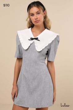 Sophisticated and playful at the same time, the Sister Jane Heron Heather Grey Bow Oversized Collar Short Sleeve Mini Dress is our new fave find! Midweight woven fabric boasts a heathered effect as it shapes short sleeves and a fitted bodice that features an oversized, statement collar with ruffled trim and a removable beaded bow detail. Fit-and-flare silhouette falls to a mini hem. Hidden zipper at back. Fit: This garment fits true to size. Length: Mid-thigh. Size uk m/us 6 measures 33.5" from Collar Mini Dress, Beaded Bow, Statement Collar, Sister Jane, Oversized Collar, Mesh Sleeves, Short Sleeve Mini Dress, Alternative Girls, Mini Dress With Sleeves