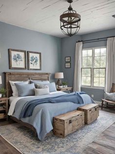 a bedroom with blue walls and wooden furniture