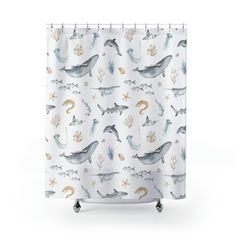 a shower curtain with sea animals on it