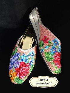 Peranakan beaded slippers, also known as kasut manek, meaning beaded shoes, is worn by a Nyonya to complete her Sarong Kebaya outfit. The colours and motifs for Nyonya beadwork often reflect a combination of Chinese, Malay, Indian and European influences.  In the past, young female Nyonyas were required to make a pair for themselves and their husbands to be. Kasut manek suitable to wear with sarong-kebaya for a traditional look, and suitable for a casual look too. Panel is cushioned for comforta Traditional Handmade Slippers With Round Toe, Traditional Multicolor Closed Toe Slippers, Traditional Embroidered Round Toe Slippers, Traditional Round Toe Slippers For Spring, Traditional Embroidered Slip-on Slippers, Traditional Handmade Slippers For Spring, Traditional Multicolor Slip-on Slippers, Traditional Open Toe Slippers For Spring, Traditional Flat Heel Summer Slippers