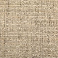 an upholstered fabric textured with light brown and beige colors photo by shutterstocker