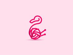 the letter s is made up of pink yarn and has a heart shaped tail on it