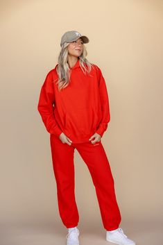 Ready to ditch the desk and dive into comfort? The Out of Office Set has got your back! The hoodie flaunts a playful message on the back, complete with a hood and front pocket. The sweats add extra chill with an elastic waistband, jogger-style pant legs, and pockets for all your essentials. Perfect for lounging in style out of the office (of course). fleece-lined Casual Red Tracksuit For Loungewear, Red Sweats For Fall Loungewear, Red Fall Loungewear Sweats, Red Athleisure Sweats For Streetwear, Red Cotton Activewear For Loungewear, Red Hooded Casual Activewear, Casual Red Hooded Activewear, Red Fleece Athleisure Sweatpants, Casual Red Fleece Activewear