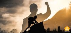 the silhouette of a man with a backpack on top of a mountain in front of clouds