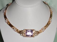 NATURAL UNTREATED 54CT SQUARE CKB SOFT PINK TOPAZ GEMSTONE, SWAROVSKI CRYSTALS, PEARLS, 14KT YELLOW GOLD OMEGA NECKLACE 18 1/2"  4mm AB Clear, AB soft Rose Swarovski Crystals, and Pearls. The band is approximately 1/2" wide and 18 1/2" long. I've created a hook-and-eye closure.  The necklace comes in a necklace case and an outer 2pc gift box. Pink Gemstone Jewelry For Evening, Formal Pink High Luster Necklace, Pink Gemstone Accents Necklaces For Formal Occasions, High Luster Pink Jewelry For Anniversary, Formal Pink Necklaces With Gemstone Accents, Formal Pink Gemstone Accented Necklaces, Exquisite Pink Gemstone Necklaces, Pink Crystal Glamorous Necklace, Elegant Pink Faceted Crystal Necklace