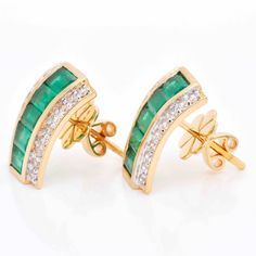 Delight in the opulence of these 18 karat yellow gold 2.91 carat emerald baguette diamond cluster stud earrings. A truly captivating adornment, these earrings feature lush green Zambian emeralds and dazzling diamonds, creating an exquisite display of luxury. Fine Jewelry Emerald With Baguette Diamonds, Fine Jewelry With Baguette Diamonds And Emerald, Emerald Yellow Gold Diamond Earrings Fine Jewelry, Emerald Yellow Gold Diamond Earrings, Elegant Green Emerald Cut Diamond Earrings, Elegant Green Emerald-cut Diamond Earrings, Elegant Green Baguette Cut Earrings, Green Baguette Cut Earrings For Gifts, Emerald Earrings With Diamond Accents In Green