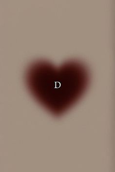 a heart shaped object with the letter d in it