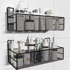 two black mesh shelves holding bottles and soaps