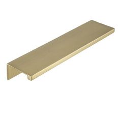 an image of a brass colored shelf