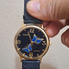 Blue Butterflies Ladies Watch This Cute Vintage Glittery Blue Butterflies Genuine Leather Black Band Quartz Ladies Fashion Wrist Watch is in Good Condition.  New Battery Installed & Runs Perfectly. It is made by Mandy.  An Awesome Vintage Watch For The Collector. Please see pictures before purchasing. Butterfly Watch, Blue Butterflies, Wristwatch Fashion, Women Wrist Watch, Ladies Watch, Blue Butterfly, Wrist Watches, Ladies Fashion, Vintage Watches