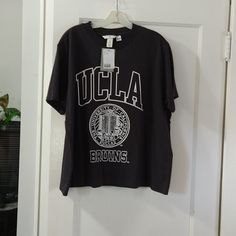 Nwt, Ucla T-Shirt H&m Relaxed Fit T-shirt With Graphic Print, H&m Relaxed Fit T-shirt For Streetwear, H&m Crew Neck T-shirt With Letter Print, Sporty H&m Crew Neck Tops, H&m Sporty Crew Neck Tops, H&m Letter Print T-shirt For Summer, College Style Cotton T-shirt With Graphic Print, Relaxed Fit Graphic Print T-shirt In College Style, College Style Graphic Print Short Sleeve Top