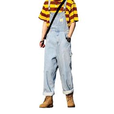 Introducing the 2023 Spring-Summer Collection of our new men's striped free denim dungarees ââ‚?the perfect way to show off your street style!Why You'll Love ThemFashionably rebellious. these dungarees feature vertical stripes and a loose fit for an effortless. laid-back look. With suspenders and a buttons closure. you'll be sure to stand out from the crowd in a stylish and comfortable way. Crafted from high-quality denim. these dungarees promise to be as durable as they are fashionable.Key High Cotton Straight Leg Overalls For Summer, Trendy Cotton Jeans With Vertical Stripes, Casual Summer Jeans With Vertical Stripes, Casual Vertical Striped Jeans For Summer, Striped Cotton Jeans For Summer, Casual Striped Overalls With Pockets, Summer Striped Cotton Jeans, Casual Vertical Stripes Denim Jeans, Striped Denim Jeans With Pockets