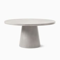 a white table with a round top on a white background in the shape of a cone