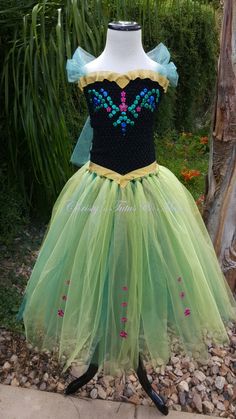 These fun, costume tutus will make you feel like the princess you are! All dresses have 2 solid layers of tulle tied around a crocheted tutu tube top. And can be made for sizes infant to size 12 in girls. Need something in a larger size? Lets redesign something that suits you! Don't see the costume you want? Just ASK! Don't want a dress or gown? No problem, i can convert any costume into a tutu skirt! Pricing starts at $75 Get this in any color(s) you like and with any bow and/or additional embe Green Princess Dress For Pageant, Green Princess Dress For Pageants, Green Princess Style Tulle Dress, Green Tulle Princess Dress For Fancy Dress, Princess Tutu Dress For Costume Party, Princess Tutu Dress With Tulle Skirt For Costume Party, Princess Style Tutu Dress For Costume Party, Green Princess Dress For Dress-up, Princess Style Tulle Tutu Dress For Fancy Dress