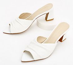 Take a smart step forward in these sophisticated mules. A pointed toe is a classic touch, making them ideal when paired with skirts, capris, or shorts. From Intentionally Blank. Chic Pointed Toe Sandals For Office, Summer Almond Toe Heels With 4-inch Heel, Classic 4-inch Heels For Summer, Chic Synthetic Mules For Office, Summer Office Heels With Closed Toe, Chic Summer Office Sandals, Summer Office Heels With Block Heel, Classic Low Heel Summer Heels, Classic Open Heel Kitten Heels For Spring