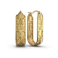 Discover the opulence of Italian Baroque with these stunning earrings. Crafted in Italy, these exquisite earrings feature a long rectangular shape and intricate acanthus leaf decorations, capturing the essence of Baroque artistry. Made with 14k gold, they radiate luxury and elegance. Elevate your style with these remarkable pieces that blend timeless design and Italian craftsmanship. Indulge in the grandeur of Baroque fashion and adorn yourself with these captivating 14k gold earrings from Italy Luxury Baroque Earrings, Rectangular Earrings, Italian Baroque, 18k Gold Earrings, Italian Craftsmanship, Italian Jewelry, Acanthus Leaf, Leaf Decor, Baroque Fashion