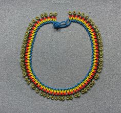 This beautiful beaded necklace is hand-woven by the women of the Embera Chami Indigenous Tribe of Colombia Fair Trade Beaded Necklaces For Festivals, Fair Trade Beaded Necklaces With Round Beads For Festivals, Hand-strung Beaded Necklaces For Festivals, Hand-strung Choker With Round Beads For Festival, Hand-strung Round Beads Choker For Festival, Adjustable Handwoven Beaded Necklaces For Festivals, Fair Trade Round Beads For Festivals, Handwoven Beaded Necklace For Festival, Festival Choker With Hand-strung Round Beads