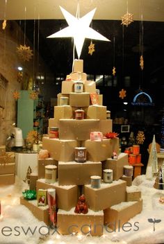 a christmas tree made out of cardboard boxes