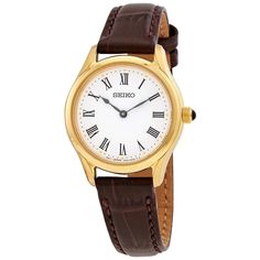 This stylish Seiko quartz watch is the perfect accessory for any Instagram occasion. A gold-toned case pairs beautifully with its premium brown leather strap, and the pristine white dial with Roman numeral markers provides effortless elegance. Water resistant and scratch resistant sapphire crystal ensure it holds up to your active lifestyle. At under 30mm, its petite yet polished look will complement any outfit in your feed. Quality craftsmanship and Swiss quartz precision make it a watch to be Yellow Gold Leather Chronograph Watch Accessories, Yellow Gold Leather Watch Accessories With Chronograph, Formal Brown Watch With Leather Strap, Classic Brown Watch, Classic Yellow Gold Leather Watches, Classic Leather Watch With Round Dial, Classic Brown Quartz Watch, Classic Brown Watch Accessories With Metal Dial, Classic Brown Leather Strap Watches