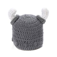 a gray crocheted hat with white horns on it's ears and tail