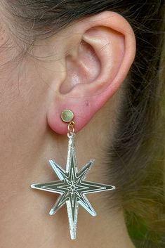 Silver earrings with a unique star shape and a lightweight feel. They are fashionable and are fun for the holidays. From the vendor; We devote great care to crafting every piece, ensuring a high level of attention to detail. Our use of nickel-free metal ensures that each piece is hypoallergenic. While our earrings are designed to be durable, we suggest handling them with care, as they are works of wearable art. Nickel free. Handmade Star-shaped Earrings For Gift, Star-shaped Earrings For Pierced Ears As A Gift, Star-shaped Nickel-free Plug Earrings As Gift, Star-shaped Nickel-free Plug Earrings For Gift, Star Shaped Nickel Free Plug Earrings For Gift, Nickel-free Star Shaped Plug Earrings For Gift, Nickel-free Star Jewelry For Parties, Nickel Free Star Shaped Party Jewelry, Star-shaped Pierced Earrings As Gift