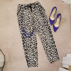 Jogger Style Pants. Elastic In Back Of Waist, Zipper, Hook And Tie In Front. Pockets. 100% Polyester Casual Leopard Print Pants For Work, Casual Leopard Print Workwear Pants, Casual Leopard Print Bottoms For Day Out, Leopard Print Loungewear Bottoms For Spring, Spring Leopard Print Loungewear Bottoms, Leopard Print Pants For Summer Loungewear, Leopard Print Loungewear Pants For Summer, Summer Loungewear Leopard Print Pants, Summer Leopard Print Loungewear Pants