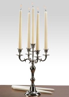 a candelabra with five candles on it