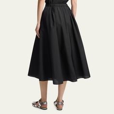 Theory midi skirt with minimalist details and on-seam pockets Elastic waist at the back Hem falls below the knee Circle-cut silhouette Slip-on style Cotton Dry clean Imported Minimalist Details, Midi Circle Skirt, Full Circle, Circle Skirt, Bergdorf Goodman, Top Designers, The Knee, Midi Skirt, Elastic Waist