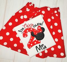 a minnie mouse birthday shirt and pants with the number two on it's side