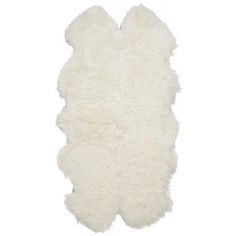 a white sheepskin rug is shown on a white background, with the fur in the shape of an animal's tail