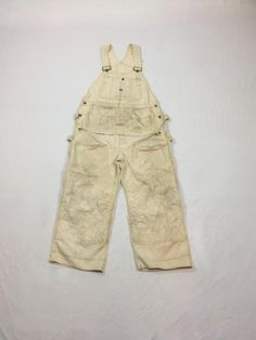 vintage 1950s bib overalls Bayly Union Made (Union cloth tag sewn into pocket) Sanforized natural white cotton canvas metal hardware adjustable straps apron waist double knee bucket front pockets donut button fly authentic age wear-see photos has been washed measures, lying flat, across top of bib-9 1/2" bib height-10 1/4" waist-18 1/2" rise-15" inseam-23" hem-11" hip-23" We do not offer returns or refunds unless something is grossly misrepresented. Please contact us within 2 business days of re White Bib Front Overalls With Pockets, White Utility Overalls With Pockets, Sewing Tags, Bib Overalls, Union Made, White Canvas, Vintage 1950s, Fashion Inspo Outfits, Cotton Canvas