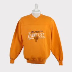 Embroidered Vintage 90s Tennessee Volunteers Sweatshirt Tennessee University Volunteers Football T Shirt Sweater Crewneck Hoodie Jacket Gift 💯 SATISFACTION AND AUTHENTICITY ⭐ MEASUREMENTS (when laid flat) Size on Tag: M Length: 70cm or 27.5 inches Armpit to armpit: 58cm or 23 inches ⭐ CONDITION 9/10 (Very good) Details: No holes Material: Cotton Color: Yellow Brand: Crable Sportswear Throwback Fleece Sweatshirt For Fall, Retro Sweatshirt For Fall Sports Events, Retro Sweatshirt For Sports Events In Fall, Throwback Fleece Sweatshirt For College, Vintage Crew Hoodie For Winter, Vintage Crew Neck Winter Hoodie, Vintage Winter Crew Hoodie, Retro Fall Sports Hoodie, Retro Fall Hoodie For Sports