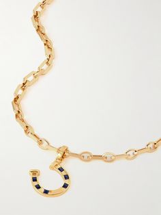 Martha Calvo's playful pieces are designed to be mixed and matched. This necklace is crafted from gold-plated metal and strung with a horseshoe charm encrusted with glimmering sapphires. Layer yours with the brand's other western-inspired pieces. Martha Calvo Necklace, Gold Horseshoe Charm Necklace As Gift, Sapphire Necklace Gold, Yellow Gold Horseshoe Necklace Gift, Vintage Tarnish-resistant Brass Charm Necklace, Gold Horse Design Pendant Necklace, Sapphire Necklace, Fashion Jewelry Necklaces, Fashion Watches