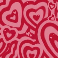 an abstract red and pink background with hearts