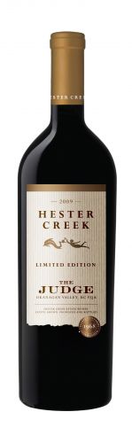 a bottle of wine that is sitting on a white surface with the words hester creek written