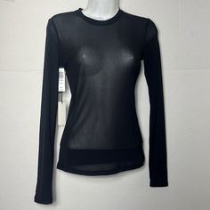 This Is A Crewneck Longsleeve A Size Xs Will Fit Someone Who Typically Wears A 0 In Other Aritzia Clothing. Depending On Body Shape And Fit Preference, A Xs May Also Fit Someone Who Wears A 00 Or 2. Bust 32 In 33 In Waist 24 In 25 In Fall Sheer Crew Neck Blouse, Sleek Long Sleeve Tops For Night Out, Casual Sheer Sleeves Top For Layering, Casual Blouse With Mesh Sleeves, Stretch Crew Neck Long Sleeve Top For Night Out, Casual Fitted Blouse With Mesh Sleeves, Sheer Sleeves Crew Neck Blouse, Sheer Crew Neck Tops For Fall, Fitted Crew Neck Blouse For Layering