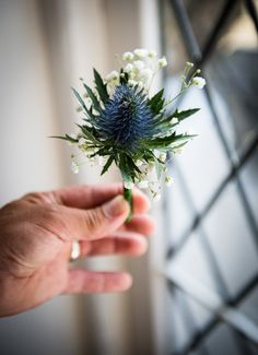 someone holding a flower in their hand with the caption saying, i love you