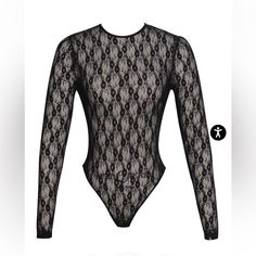 This Exquisite Piece Showcases A Captivating Allover Floral Lace Print, Featuring Long Sleeves And A High-Cut Cheeky Bottom. Crafted From Stretch Lace And Unlined, The Bodysuit Includes A 100% Cotton Gusset At The Crotch For Comfort. The Design Is Completed With An Invisible Zipper At The Center Back Neck And A Hook-And-Eye Closure At The Top Edge. Versatile And Chic, This Bodysuit Is Ideal For Celebratory Events, Birthdays, Nights Out, Vacations, Or Any Special Occasion. Exclusively Available I Black Stretch Lace Bodysuit, Chic Fitted Lace Bodysuit, Evening Black Lace Bodysuit, Black Lace Bodysuit For Evening, Elegant Black Lace Bodysuit, Elegant Black Bodysuit With Lined Body, Chic Black Lined Tops, Chic Black Lined Body Top, Chic Black Tops With Lined Body