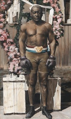 a painting of a man with boxing gloves on his chest and hands in his pockets