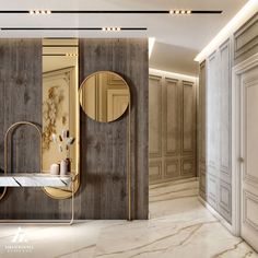 an elegant bathroom with marble floors and gold mirrors on the wall, along with two sinks