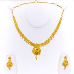 This 22k gold necklace set features a traditional laced paisley design, showcasing timeless elegance and intricate craftsmanship. Weighing 32.2 grams, the set is crafted from radiant yellow gold, with a 16-inch necklace that includes 1.75-inch adjustable links and a secure hook lock. The matching earrings, 1.6 inches in length, are equipped with screw-back posts for secure wear. The classic paisley motifs, combined with the delicate laced design, make this set perfect for those who appreciate th 22k Gold Necklace Set, 22k Gold Necklace, Paisley Motifs, Bridal Jewelry Necklace, Diamond Pendant Sets, Fancy Necklace, Fancy Rings, Mens Gold Rings, Traditional Earrings