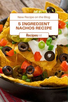 nachos in a skillet with text overlay reading new recipe on the blog 5 ingredient nachos recipe