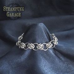 Bracelet - Steel Cloud Cover Circles - Celtic Knots - Chainmaille Four Winds, Celtic Wedding Rings, Chain Maille Jewelry, Celtic Knots, Chain Mail, Tiffany Heart, Celtic Knot, Heart Charm Bracelet, Chain Link Bracelet