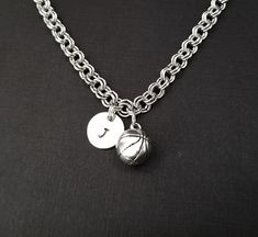 "Personalized Antique Silver Basketball Bracelet! A three dimensional basketball charm on a lovely chain bracelet makes the perfect gift for you or your favorite basketball player. The basketball bracelet charm is made from zinc alloy and measures 11 mm. The bracelet is high quality zinc alloy and measures 8.5\". The basketball player bracelet can be personalized with a .5\" silver plated disc stamped with the initial of your choice. The charm and initial disc are connected to the bracelet with Personalized Round Sports Jewelry, Personalized Adjustable Sports Jewelry, Sporty Adjustable Bracelet Jewelry, Basketball Bracelet, Sports Bracelet, Basketball Player, Bracelet Charm, Basketball Players, Charm Bracelets